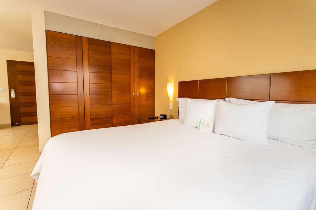 Wyndham Costa Del Sol Pucallpa Rom bilde A bedroom at the hotel